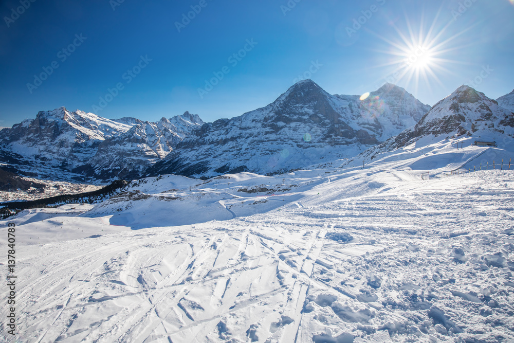 Jungfrau ski resort in Swiss Alps with famous Eiger, Monch and Jungfrau mountains in the background