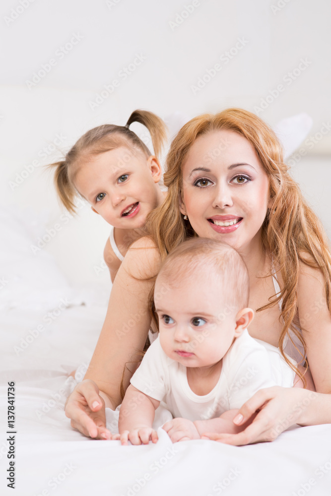 Mother playing with children