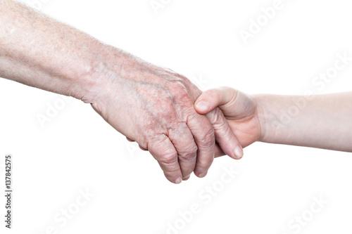Hand of an old woman greets the child hand, close-up, isolated on white background