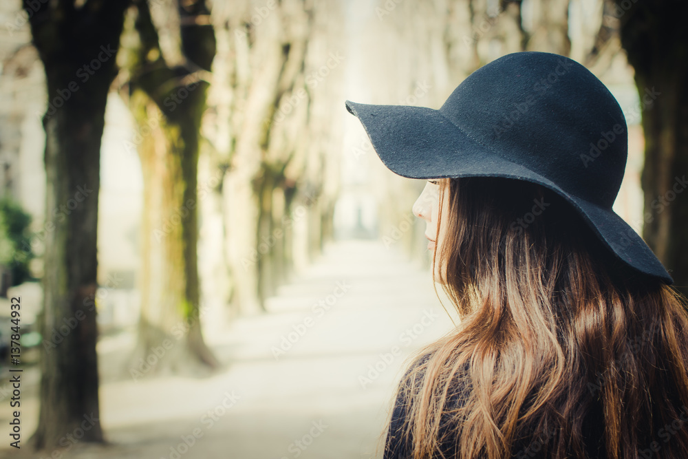 Dark-haired girl alone at cemetery Dark-haired girl alone at cemetery