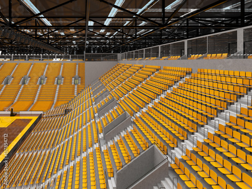 Beautiful sports arena for basketball with yellow seats and VIP boxes