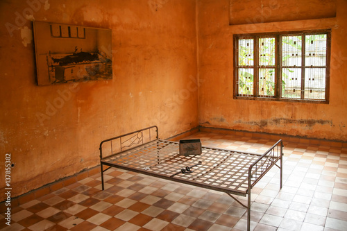 Torture bed in prison cell photo