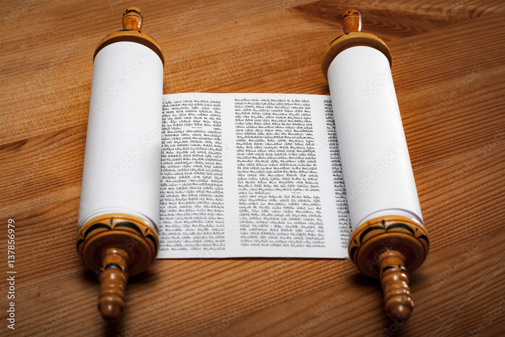 Judaism and religious text concept with a open Torah on wooden background  Stock Photo | Adobe Stock