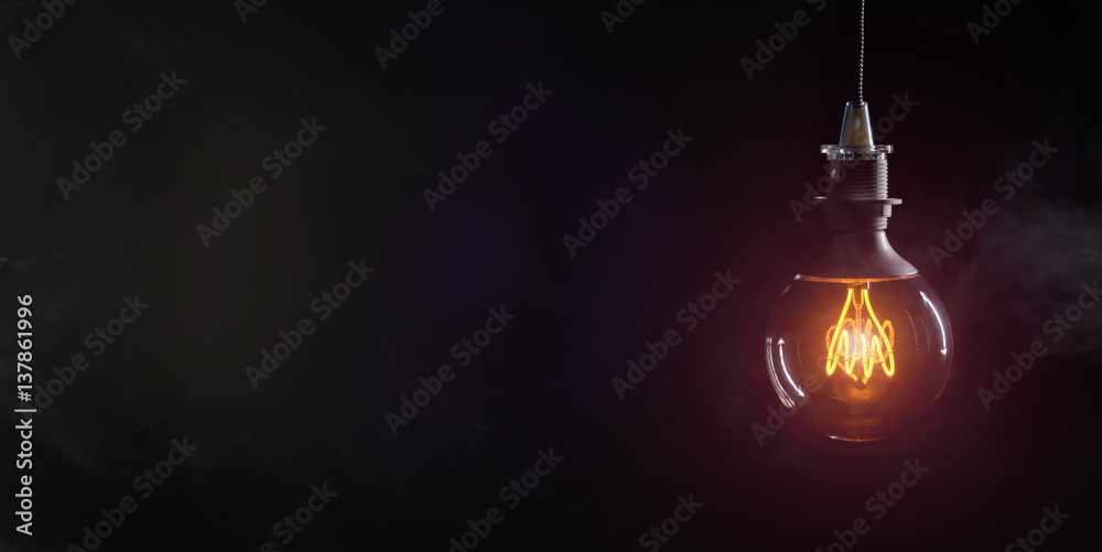 Vintage lightbulb on dark background