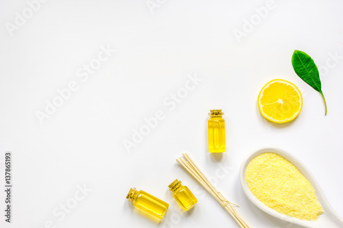 cosmetic spa set with oils and salt white background top view mock-up