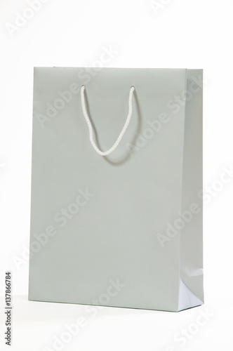 Gray paper bag isolated on white background.