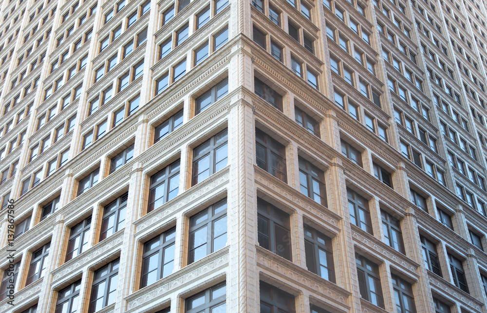 Tall building with lot of windows symmetric view Tall building with lot of windows symmetric view