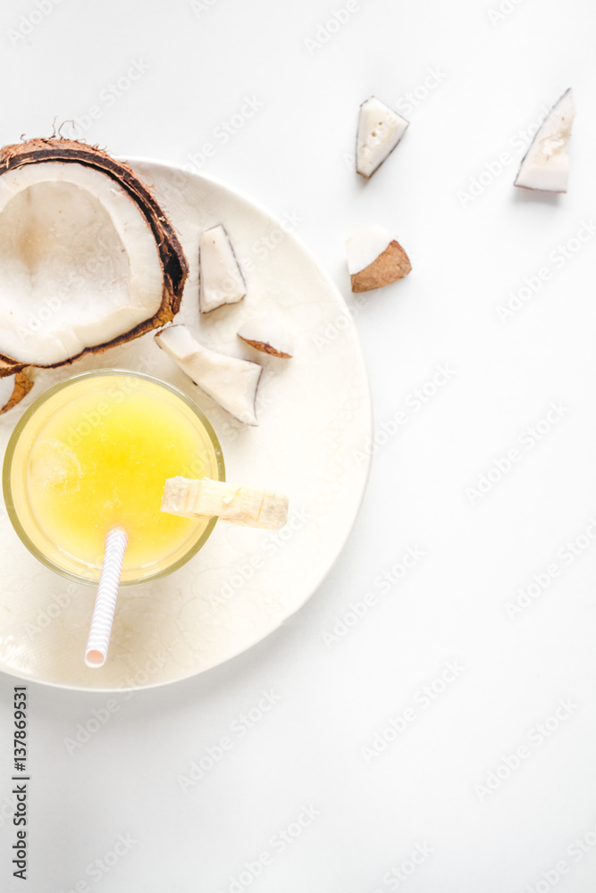 cocktail with coconut on white background top view cocktail with coconut on white background top view