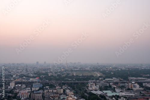 cityscape of bangkok, Thailand with Pastel color pink and purple sky with sunset © Thanaphum
