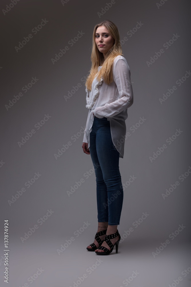 full shot studio portrait of a natural woman full shot studio portrait of a natural woman