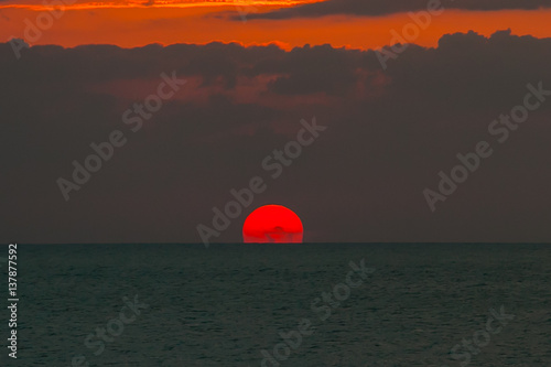 Beautiful sunset above the sea © wandee007