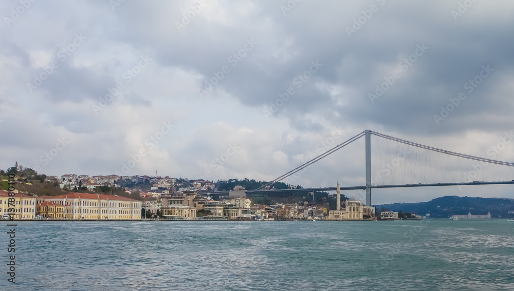 Bosphorus bridge view of Istanbul, Turkey. Dramatic cloudy sky