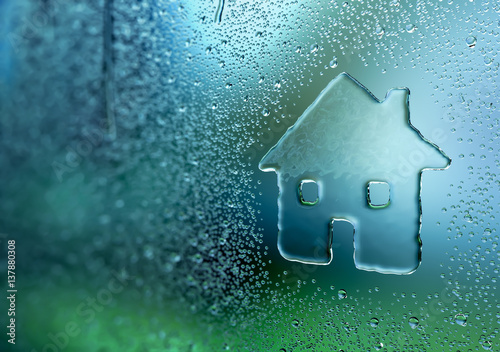 Water Drop Forming a House photo