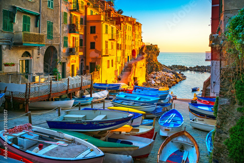 Riomaggiore village street, boats and sea. Cinque Terre, Ligury, Italy. photo