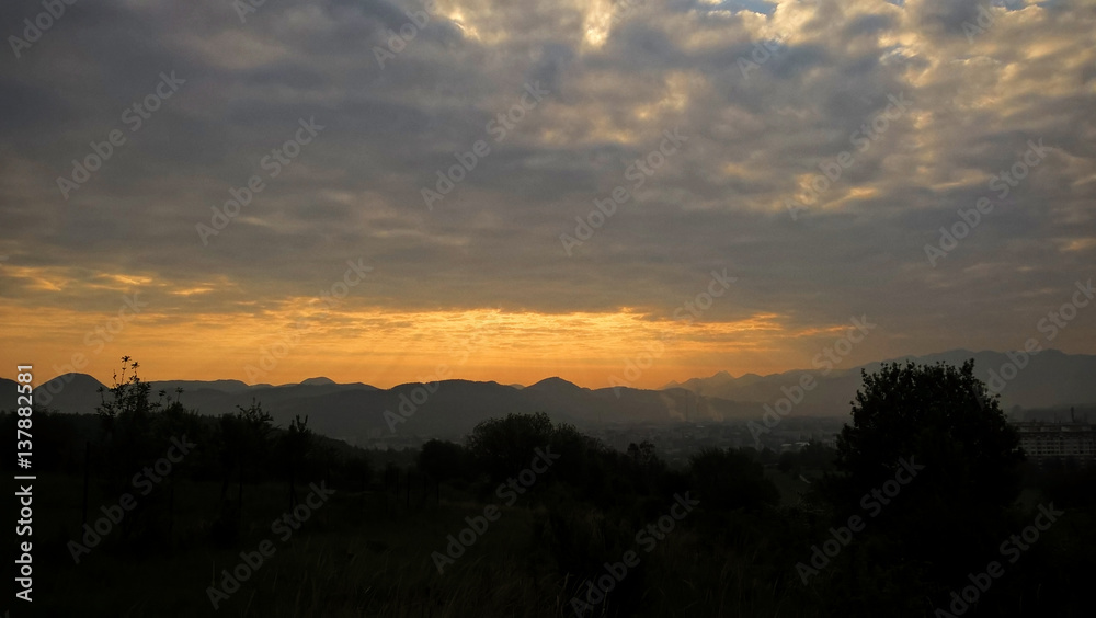 Fototapeta premium Dramatic clouds, sunrise and sunset in nature. Slovakia