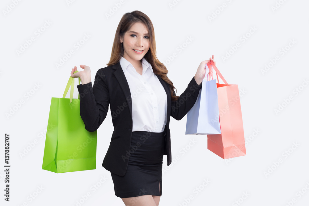Beautiful businesswoman with shopping bags Beautiful businesswoman with shopping bags