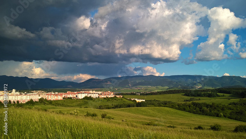 Dramatic clouds during sunset on meadow. Slovakia