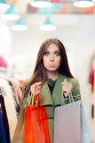 Disappointed  Shopping Woman Wearing a Green Coat in Fashion Store