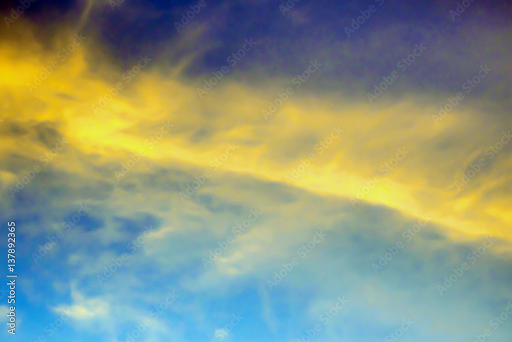 Yellow clouds in the blue sky