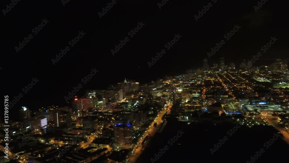 Miami Aerial v43 Flying over Miami Beach panning at night. Miami Aerial v43 Flying over Miami Beach panning at night.