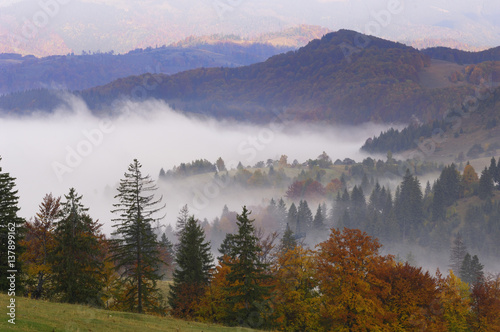 Southern Carpathian Mountains with morning mist, near Zarnesti, Transylvania, Romania, October 2008 photo