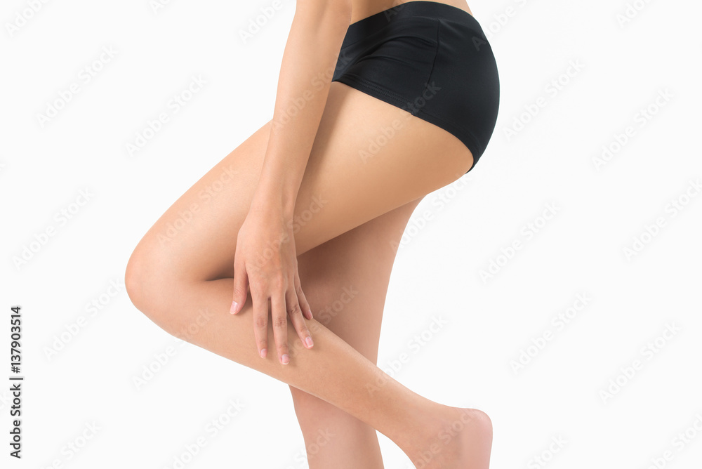 woman massage her leg in pain area isolated on white background