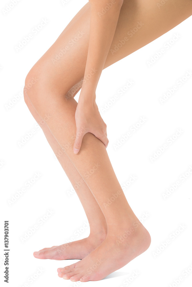 woman massage her shin and calf in pain area isolated on white background woman massage her shin and calf in pain area isolated on white background