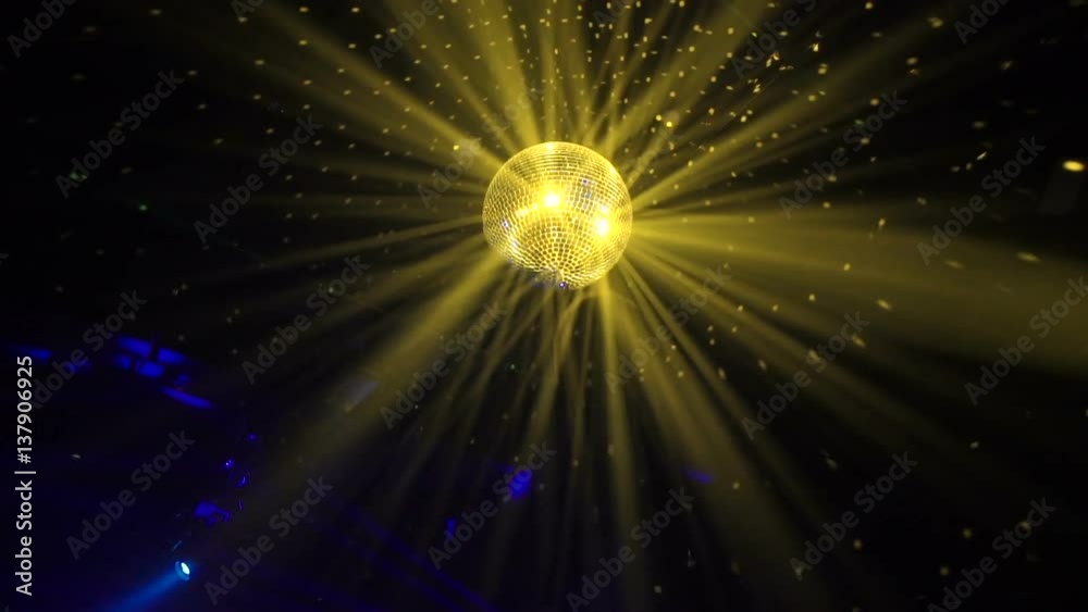 Disco ball spinning in a club Disco ball spinning in a club