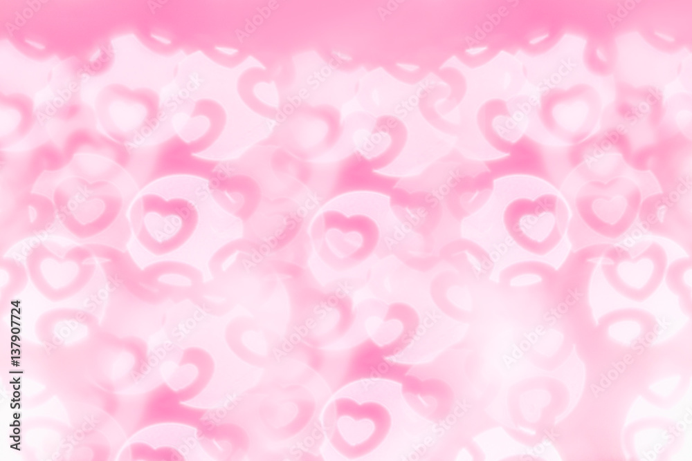 Valentine's day abstract background of soft pink, white bokeh blur hearts. Festive valentine backdrop. Valentine's day abstract background of soft pink, white bokeh blur hearts. Festive valentine backdrop.