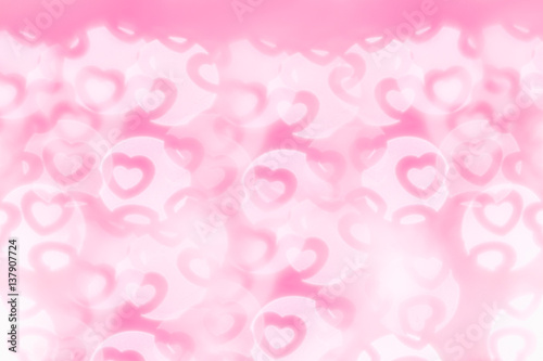  Valentine s day abstract background of soft pink  white bokeh blur hearts. Festive valentine backdrop.