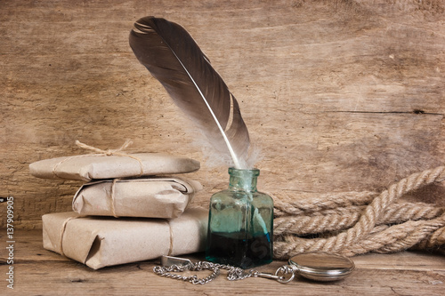 letter and a quill in the inkwell