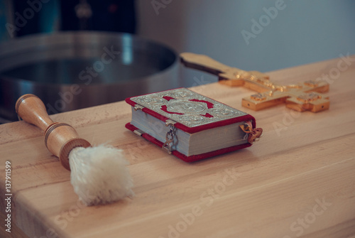 Принти на полотні Bible and orthodox cross during blessing
