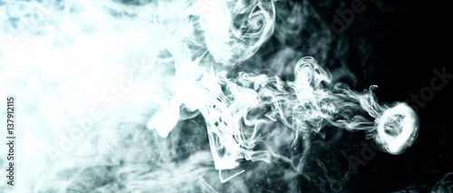 Vape trick smoke ring on dark background