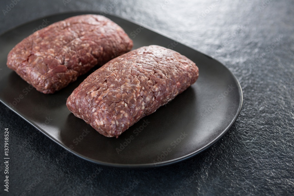 Minced beef in black plate Minced beef in black plate