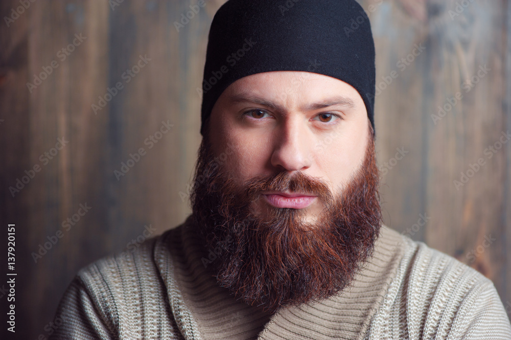 bearded man looking at camera bearded man looking at camera