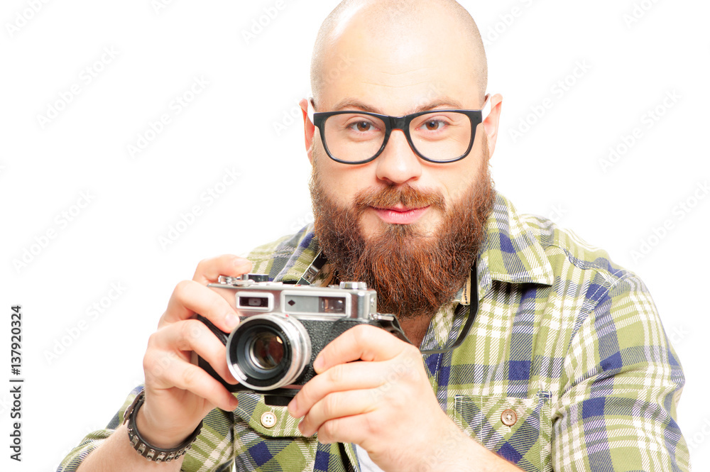 bearded man holding old-fashioned camera bearded man holding old-fashioned camera