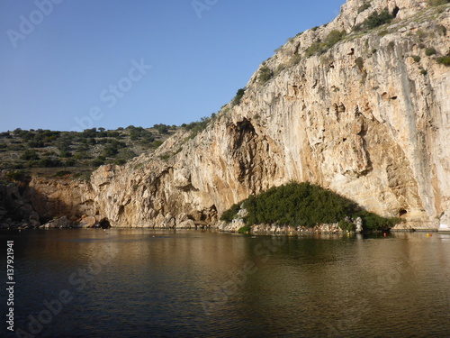 View for cliff and lake in sunny day, Greece 