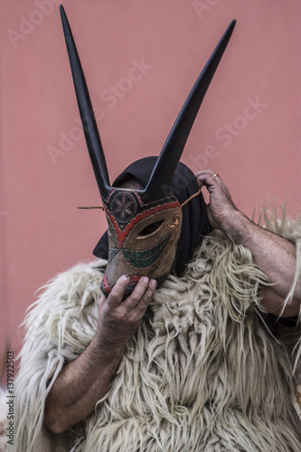 Ottana, Sardinia - Parade of traditional masks of Sardinia at the Carnival 2017 photo