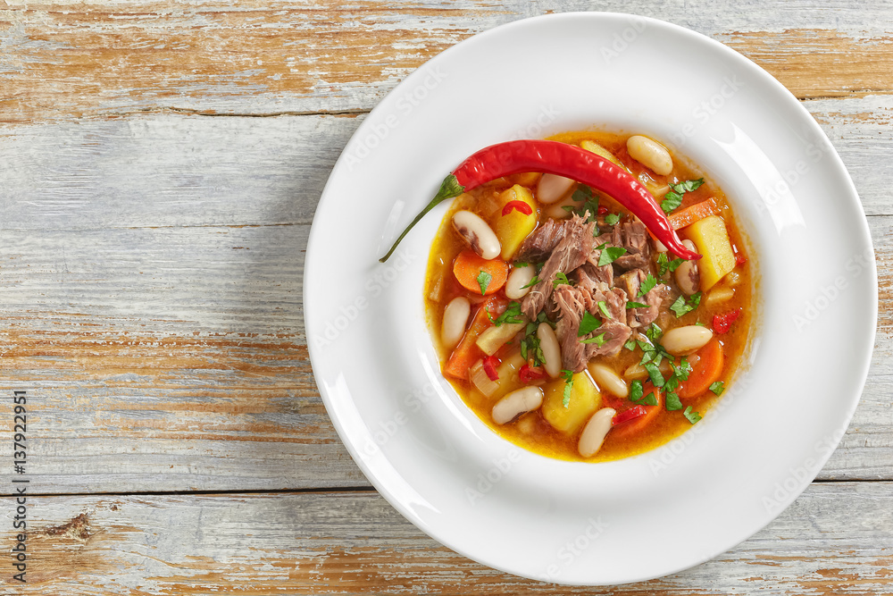 delicious hot pulled beef soup, view from above delicious hot pulled beef soup, view from above