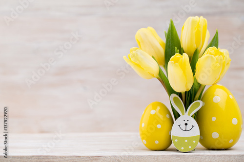 Yellow tulips  spring flowers and Easter decoration.