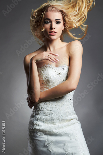 beautiful blonde bride woman in wedding dress
