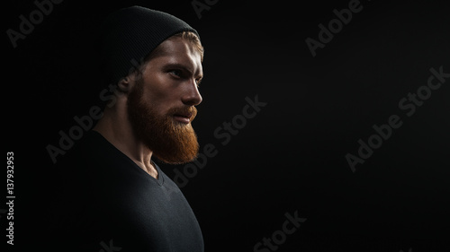 Silhouette of young bearded man hipster