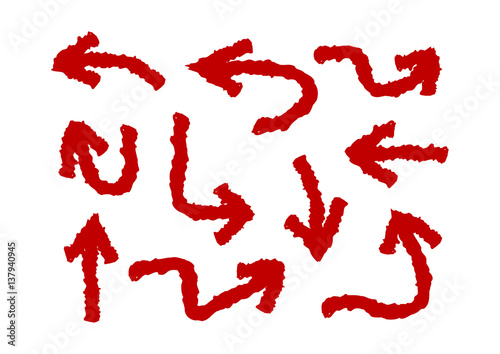Set of red arrows painted rough brush. Collection of ten isolated pointers.