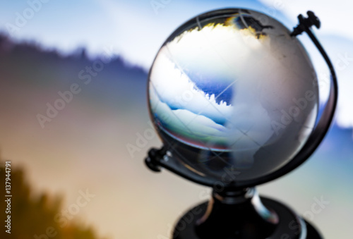 Crystal globe reflection © teerawutbunsom