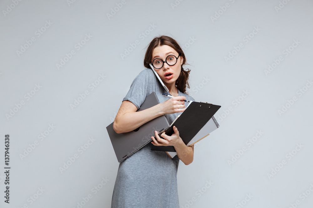 Female nerd talking on phone