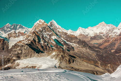 Cosmic coloured View of high Altitude Mountains in Himalaya photo