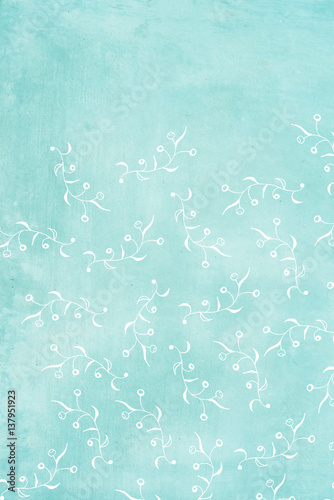 hand painted flower design on blue textured background