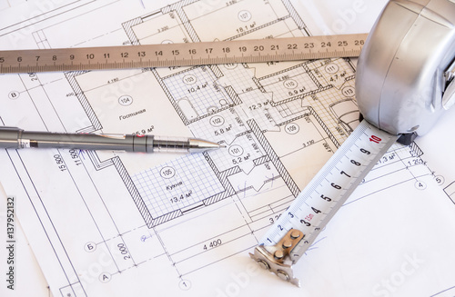 Obraz na płótnie Architectural drawings and tools of the new apartments w salonie