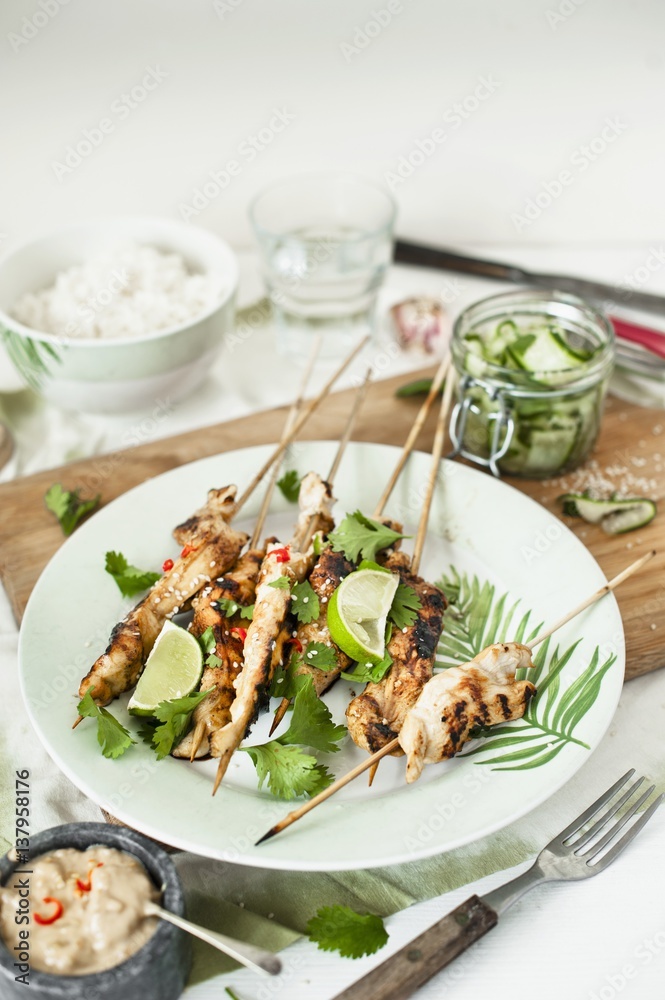 Satay skewers with coriander and limes (Asia) Satay skewers with coriander and limes (Asia)