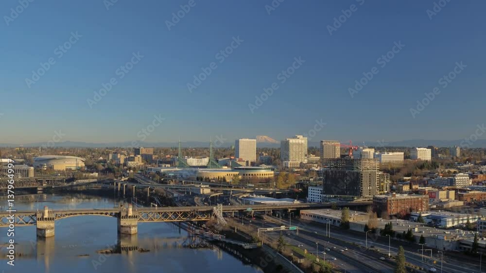 Portland Aerial v71 Flying low over Willamette River panning with eastsde bridge views at sunrise. Portland Aerial v71 Flying low over Willamette River panning with eastsde bridge views at sunrise.